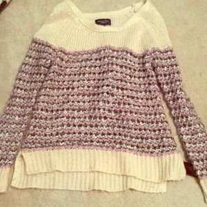 Small purple and pink knitted sweater